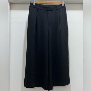 Dressy black gaucho pants.